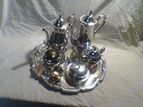 A Old Vintage "W.M. Roger" Tea Set on Tray Tea Strainer,Butter Dish. In Good condition for it's age.
