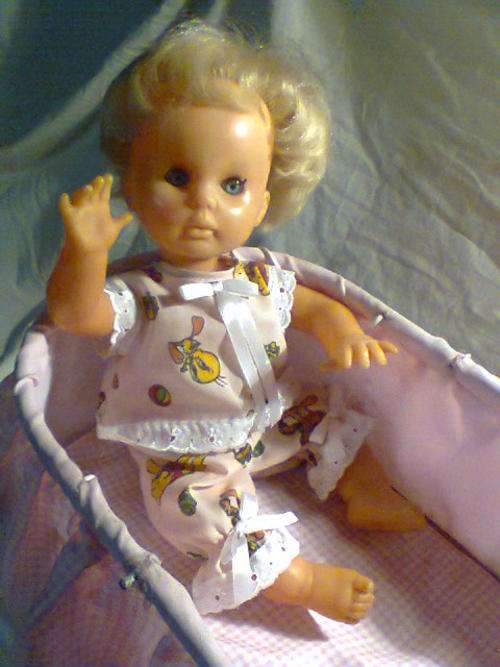 A Old Vintage "First Love Doll" with it's Original Clothes & a Fancy Frilly Old Style Pram.