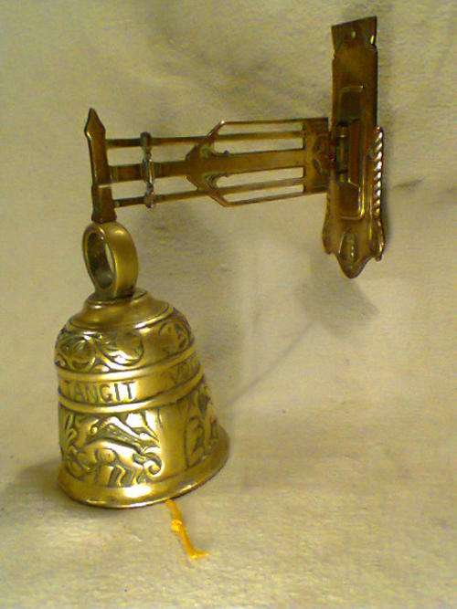 An Unusual solid Brass Bell & Bracket Size: 250mm Wide X 246mm Tall. in excellent condition.
