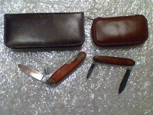 2 Old used Knives (1 x Switzerland) + 2 Traveling Manicure Sets 1 x "AUSTRIA" All in used Condition.