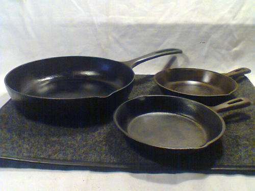 3 Awesome Cast Iron Skillets, ideal for camping.One large & Two smaller ones 6 1/2" Pans with Spouts