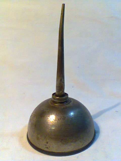 A awesome old Oil Can. My Gran used to oil her sewing machine with it. In good used S/H condition.