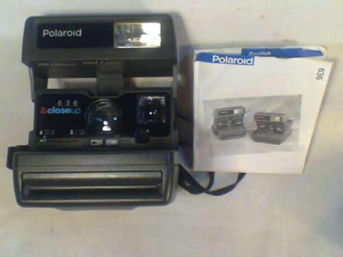A Old Vintage in Original Box "Polaroid 636"Instant Camera made"United Kingdom"In working Condition.