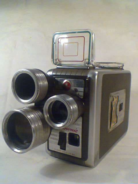 A VINTAGE Kodak Brownie Movie recording 3 Lens Camera with original Leather Case in 100% Condition.