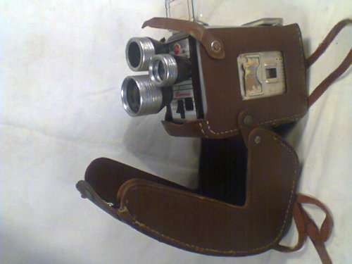 A VINTAGE Kodak Brownie Movie recording 3 Lens Camera with original Leather Case in 100% Condition.