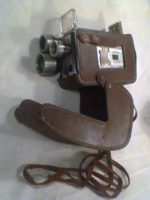 A VINTAGE Kodak Brownie Movie recording 3 Lens Camera with original Leather Case in 100% Condition.