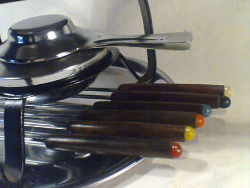 A Vintage old Fondue set complete with 6 forks & Tray All pieces marked L van Rensburg. Ready to use