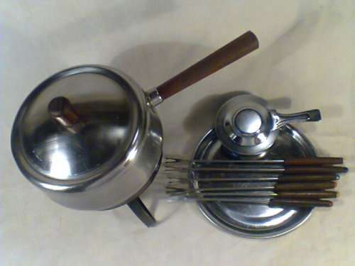 A Vintage old Fondue set complete with 6 forks & Tray All pieces marked L van Rensburg. Ready to use
