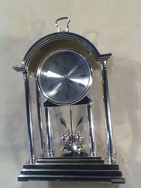 A working "Recardo" mantel Clock with a Alarm Plus a Brass Carrage Clock & a Key ring set with Light
