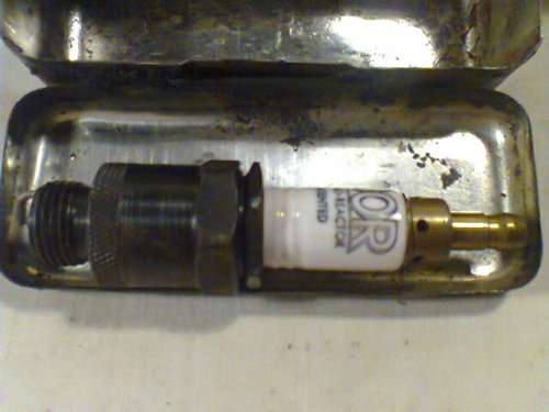 A unusual Lot "Man Cave" A New 1940's"ALDOR" Thermo-Reactor Oil Firing S/Plug in old tin+ B/Shell.