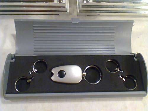 A "Recardo"& "Farah" mantel Clock's with a Alarm's & a Key ring set with Light. Watches are working.