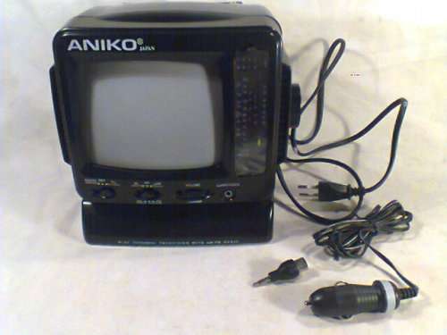 A Mini Personal TV with AM/FM Radio made by ANIKO Japan in it's original Box. The radio plays well.