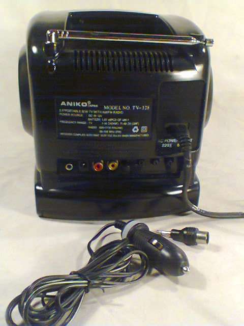 A Mini Personal TV with AM/FM Radio made by ANIKO Japan in it's original Box. The radio plays well.