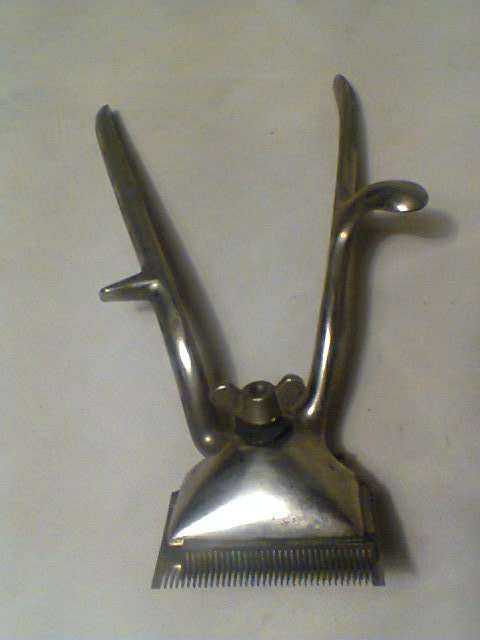 From my Granddad's time A Genuine Boxed "EZEKUT" Hair Clipper set with Directions. In working Order.