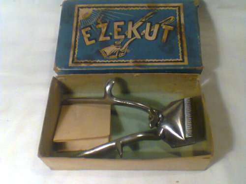 From my Granddad's time A Genuine Boxed "EZEKUT" Hair Clipper set with Directions. In working Order.