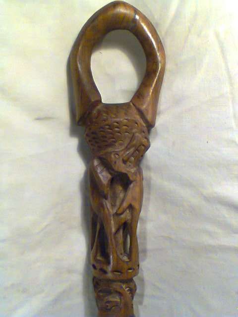 A Central African Fertility Walking Stick.With a lot of fretwork on the shaft.81cm Tall & Good Order