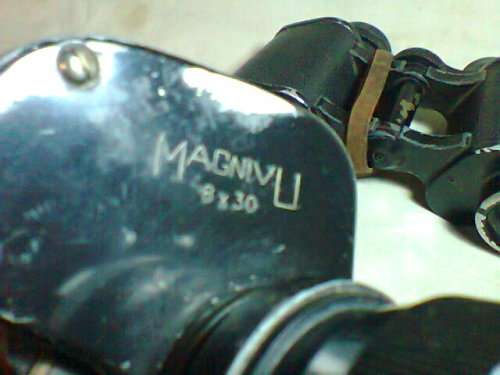 A Job lot . "Magnivu & Hilka" 2 x Binoculars both in need of repair. In used second hand condition.