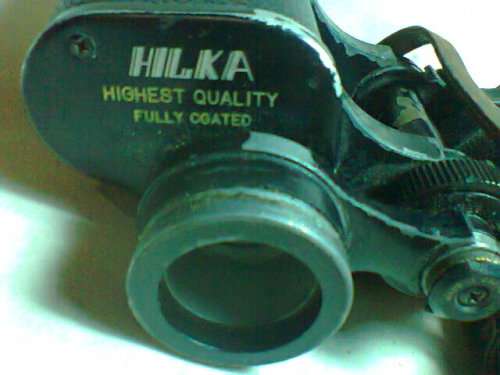 A Job lot . "Magnivu & Hilka" 2 x Binoculars both in need of repair. In used second hand condition.