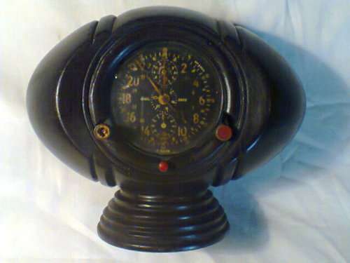 U.S.A.Navy Military Jaeger 8 Day Aircraft Clock made in Switzerland in 1930 mounted in a Wood frame.