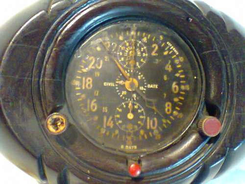 U.S.A.Navy Military Jaeger 8 Day Aircraft Clock made in Switzerland in 1930 mounted in a Wood frame.