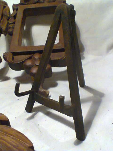 2 Collectible elegant wooden frames plus a small Oil on steel Easel.Good second hand use Condition