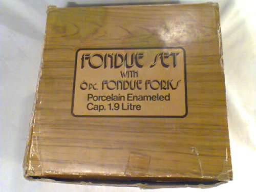 A Almost new/Used complete Enamel "FONDUE set" in Original Box. Ready for U to set out at the party.