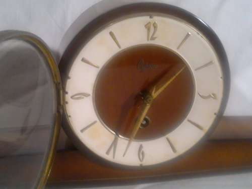 A Vintage "Cyrano" with a "Lauffer" Western in Germany Mantel Clock in used condition.