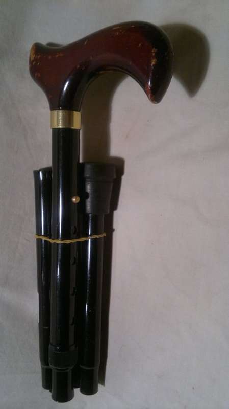 Wow a Steel folding walking, ideal to store in the pocket. Size: 300mm when folded-up & 910mm Total