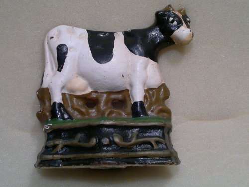 3 Cast Iron Door/Book Stops with a Cow motifs in clean condition.Sizes: 100mm T x 95mm L .