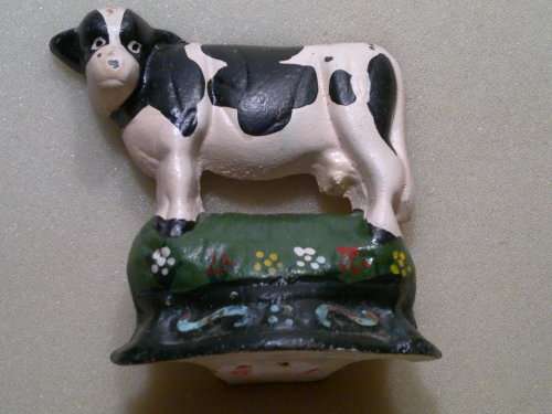 3 Cast Iron Door/Book Stops with a Cow motifs in clean condition.Sizes: 100mm T x 95mm L .