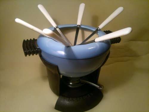 " Le Creuset"   R2495- on eBay.WoW Enamel and Original Fondue Set plus 6 Stamped "Le Creuset" Forks.