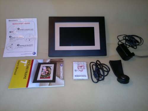 A  7" Digital Picture Frame with Remote, charger, bracket, Wires, books and in good working order.
