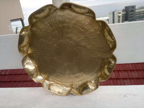 A Very Large Vintage solid Heavy Brass Round Tray it is hand beaten with a lot of work on sides