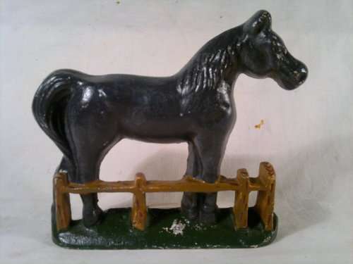 A collectible Vintage "Horse" motif Cast Iron Door stop.Ideal for display. Sold as used second hand.