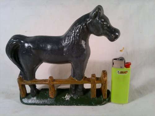 A collectible Vintage "Horse" motif Cast Iron Door stop.Ideal for display. Sold as used second hand.