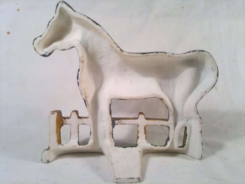 A collectible Vintage "Horse" motif Cast Iron Door stop.Ideal for display. Sold as used second hand.