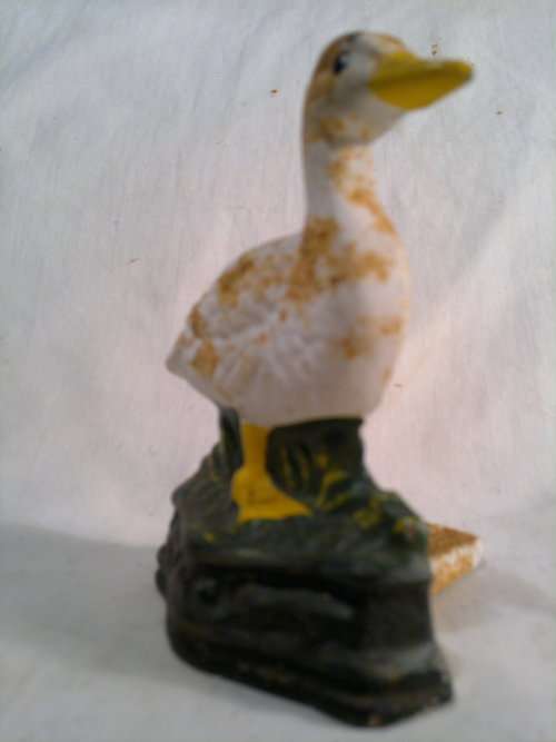 A collectible Vintage "Duck" motif Cast Iron Door stop.Ideal for display. Sold as used second hand.