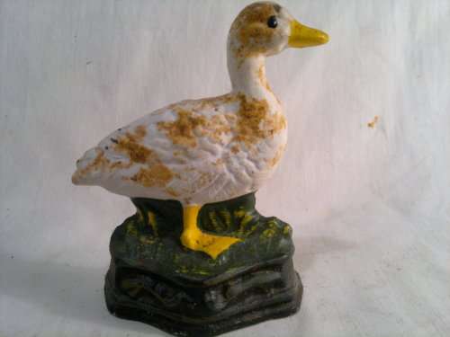 A collectible Vintage "Duck" motif Cast Iron Door stop.Ideal for display. Sold as used second hand.