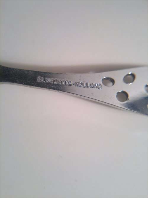 Vintage "Eetrite-Holland" Boxed Tea Sieve & Sugar Spoon with instructions.In good used condition.