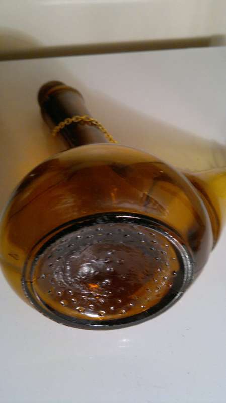 WoW 2 Unique Brown bottles. A Monk made in ITALY and a Wine flask with stopper & chain. Sold as used