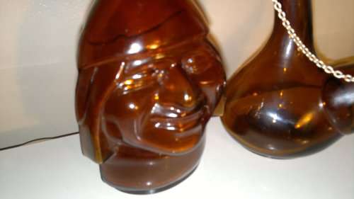 WoW 2 Unique Brown bottles. A Monk made in ITALY and a Wine flask with stopper & chain. Sold as used