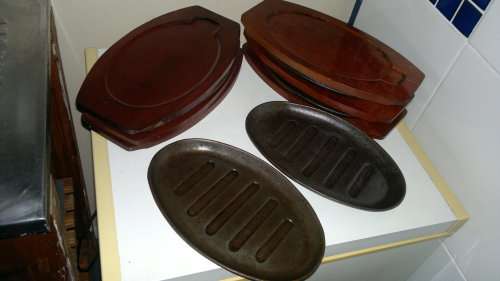 Vintage. 6 Cast Iron on wooden bases Stake Plates. Ideal for the family braai. Sold as used s/hand.
