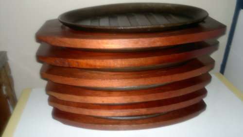 Vintage. 6 Cast Iron on wooden bases Stake Plates. Ideal for the family braai. Sold as used s/hand.