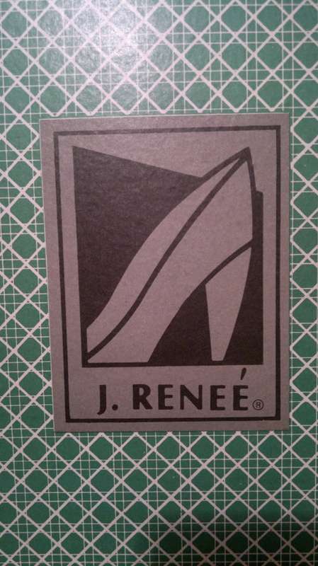 A Vintage " J. RENEE' " from an estate of a Opera singer. It's Hand made Genuine Snake.