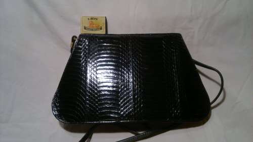 A Vintage " J. RENEE' " from an estate of a Opera singer. It's Hand made Genuine Snake.
