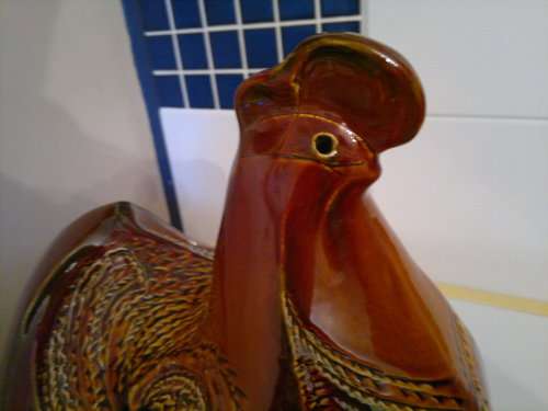 A Door stop or a display item a Large and Heavy pottery glazed Brown Hen.