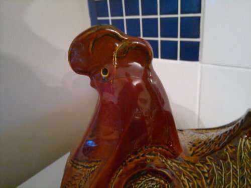 A Door stop or a display item a Large and Heavy pottery glazed Brown Hen.