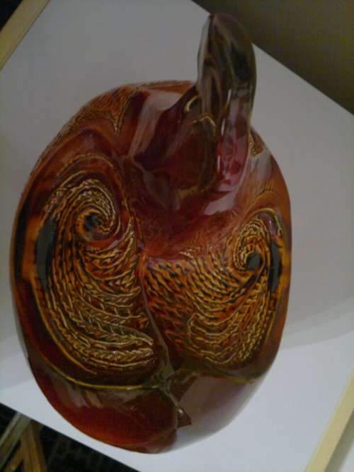 A Door stop or a display item a Large and Heavy pottery glazed Brown Hen.