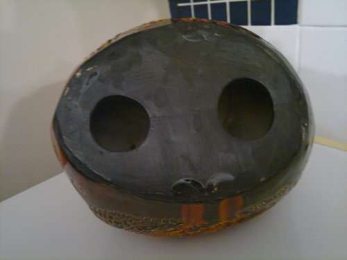 A Door stop or a display item a Large and Heavy pottery glazed Brown Hen.