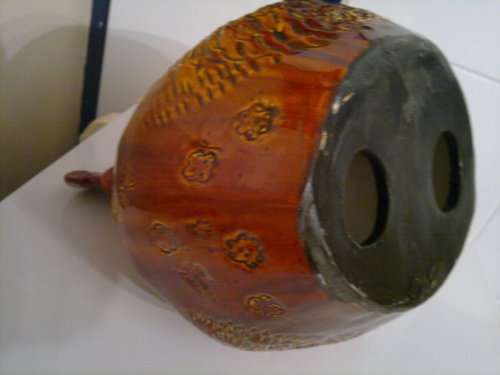 A Door stop or a display item a Large and Heavy pottery glazed Brown Hen.